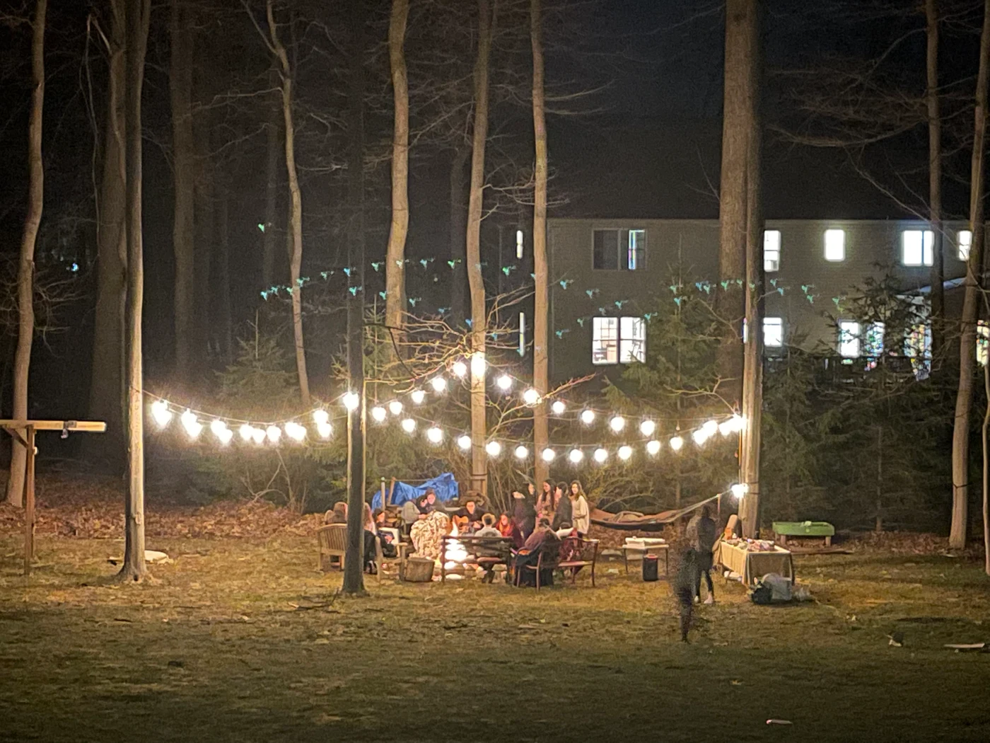 An outdoor Lighthouse gathering space lit for the evening